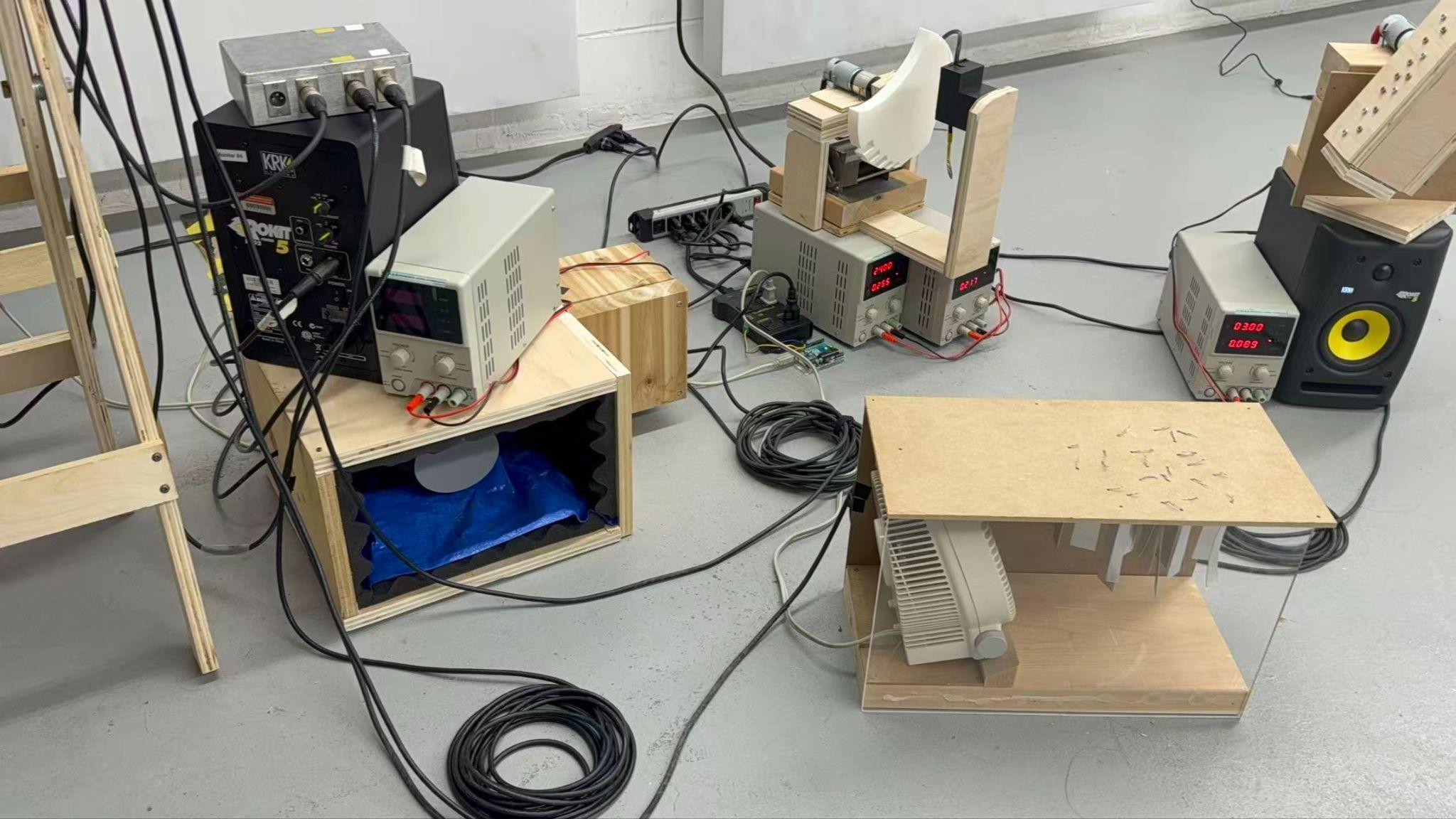 Storm City mechanical sound installation with motors, wood, fans, and speakers